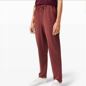 Lululemon Keep Moving 7/8 Pant size 12 women’s light burgundy (brick red) NWT!